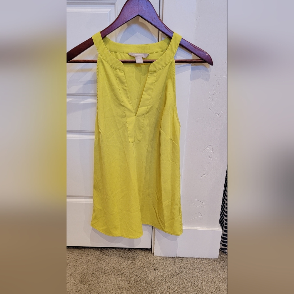 Neon yellow sleeveless blouse